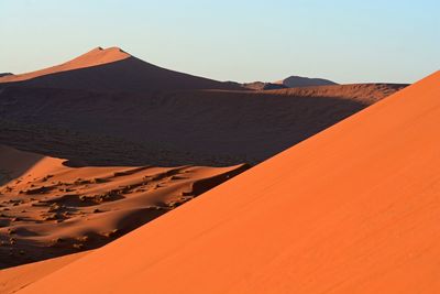 Scenic view of desert against clear sky