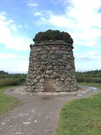 View of old ruin building against cloudy sky