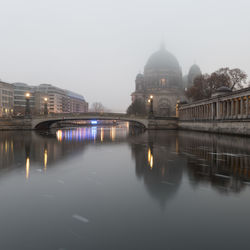 View of illuminated city at waterfront