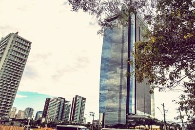 Low angle view of skyscrapers against sky