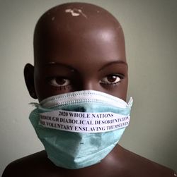 Portrait of man covering face