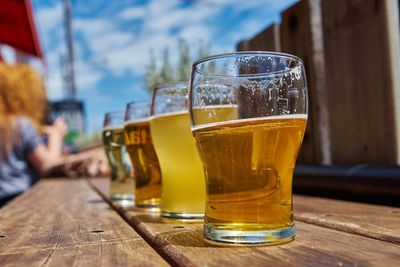 Close-up of beer glass on table