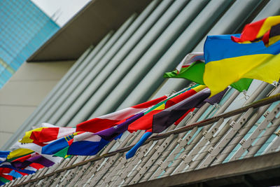 Low angle view of flags hanging on clothesline