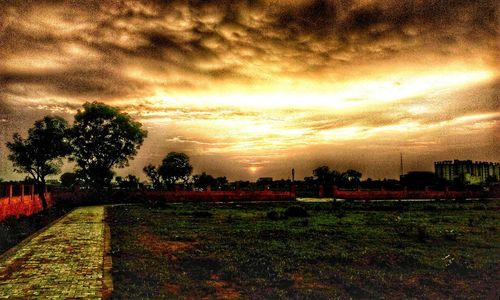 View of landscape against cloudy sky