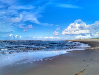 Scenic view of beach against sky