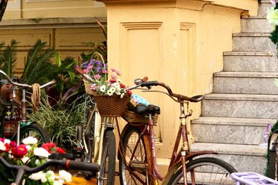 Bicycles in parking lot against building