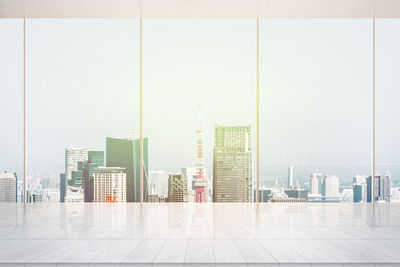 Modern buildings in city against clear sky