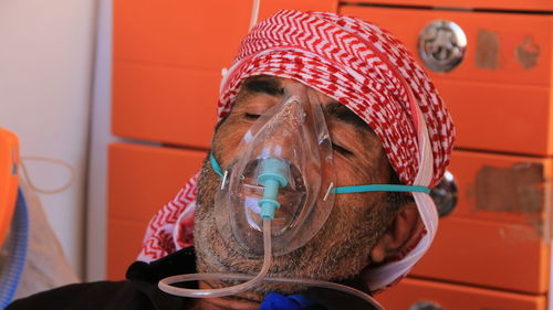 Close-up of senior man with nebulizer