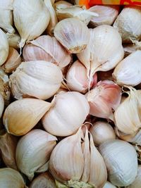 Full frame shot of onions for sale at market