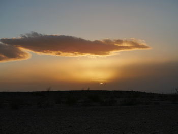 Scenic view of silhouette landscape against sky during sunset