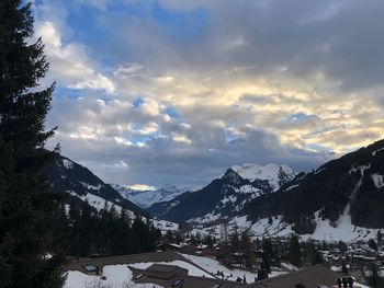 Scenic view of mountains against sky during winter