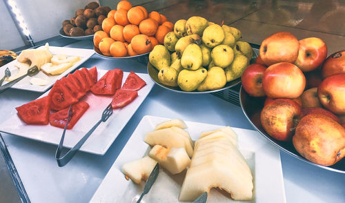 High angle view of fruits in plate on table