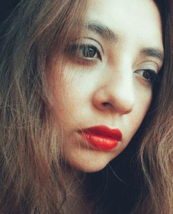 Close-up of thoughtful young woman