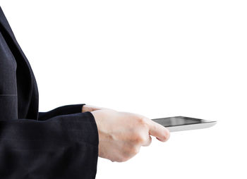 Close-up of hand against black background