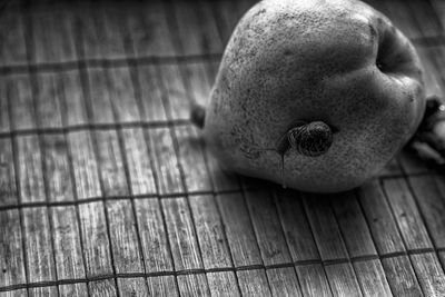 Close-up of apple on wooden table