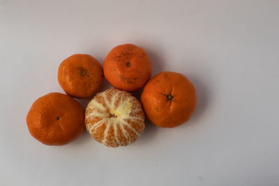 Close-up of orange fruits on table