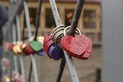 Close-up of padlocks on railing