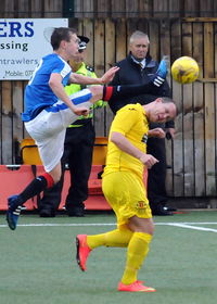 Group of people playing soccer