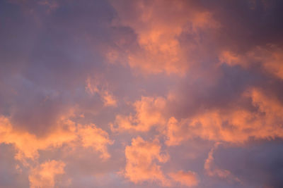 Low angle view of dramatic sky during sunset