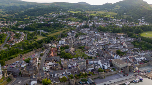 High angle view of townscape and mountains