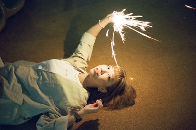 Woman lying down in sunlight