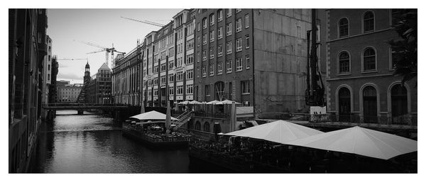 Buildings in canal along buildings