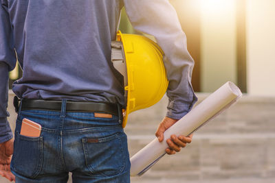 Midsection of man working at construction site