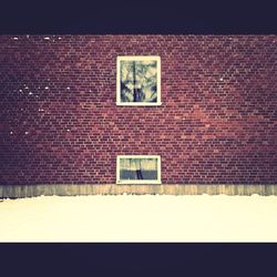 View of brick wall at night