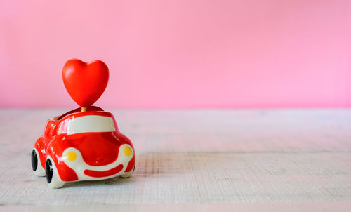 Close-up of multi colored balloons on table
