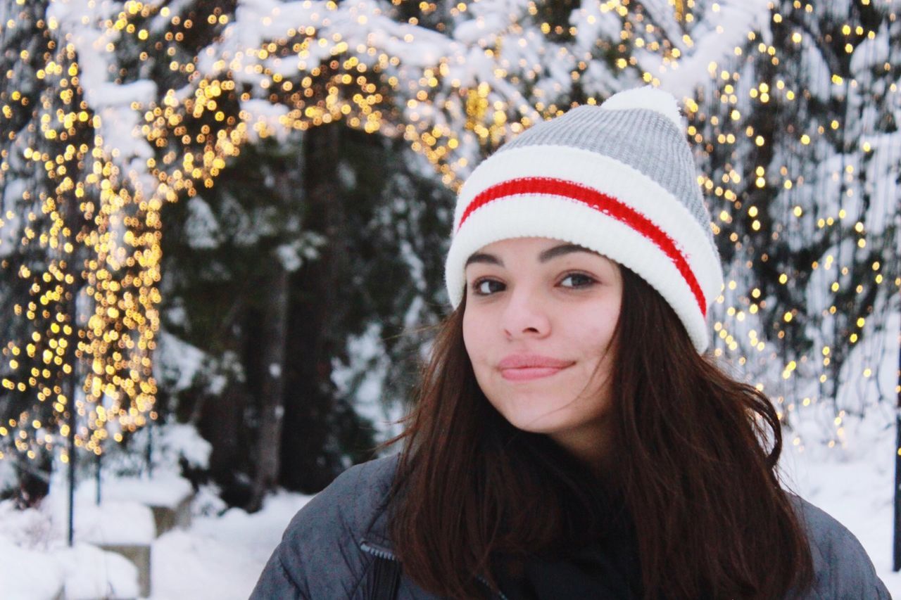 portrait, winter, headshot, one person, hat, young adult, long hair, young women, real people, looking at camera, hair, lifestyles, cold temperature, focus on foreground, leisure activity, snow, warm clothing, beauty, clothing, hairstyle, beautiful woman, outdoors, teenager