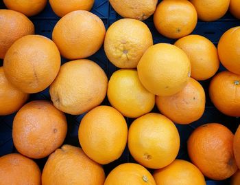 Full frame shot of oranges in market