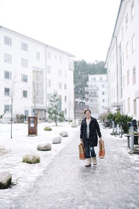 Woman carrying shopping bags