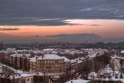 High angle view of townscape against sky during sunset