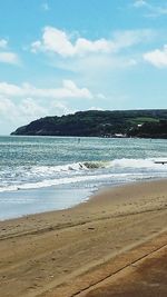 Scenic view of beach against sky