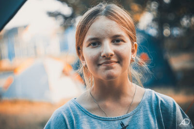 Portrait of smiling young woman