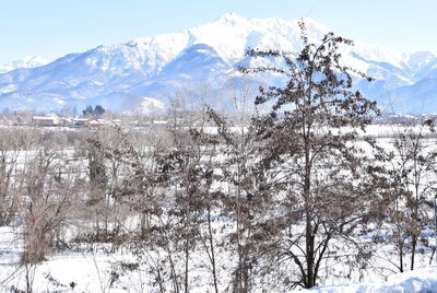Scenic view of snow covered mountains