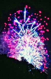 Low angle view of firework display