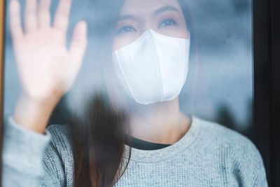 Close-up of woman wearing mask