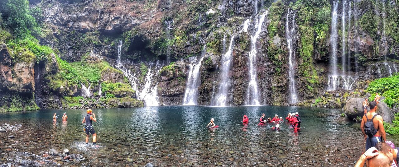 water, leisure activity, lifestyles, tree, men, swimming, person, enjoyment, waterfront, togetherness, lake, large group of people, nature, reflection, vacations, medium group of people, day, beauty in nature