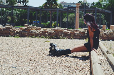 Woman sitting in park