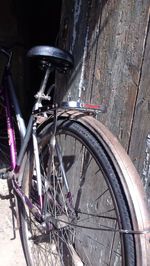 Old bicycle parked on road