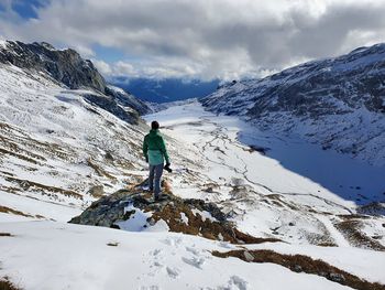 Photographer on mountain peak