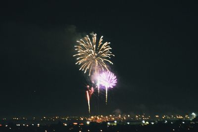 Firework display at night