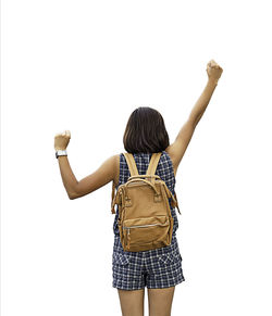 Rear view of woman standing against white background