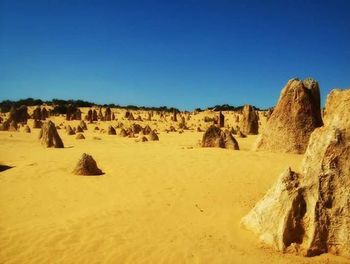 Rock formations against blue sky