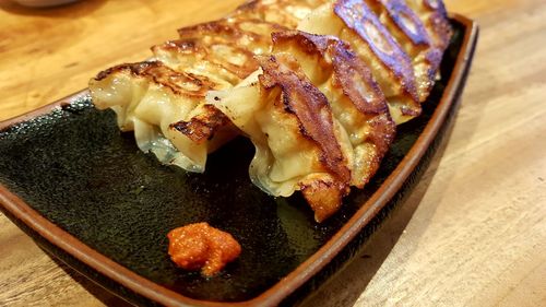 High angle view of meat in plate on table