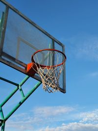 Low angle view of basketball hoop against sky