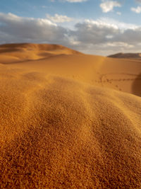 Scenic view of desert against sky during sunset
