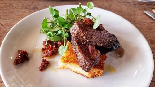 High angle view of breakfast served on table