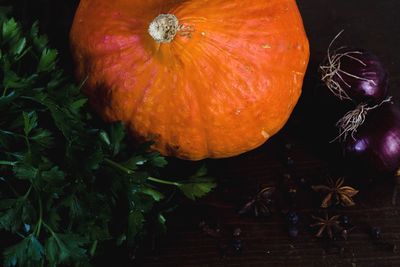 Close-up of pumpkin against orange sky